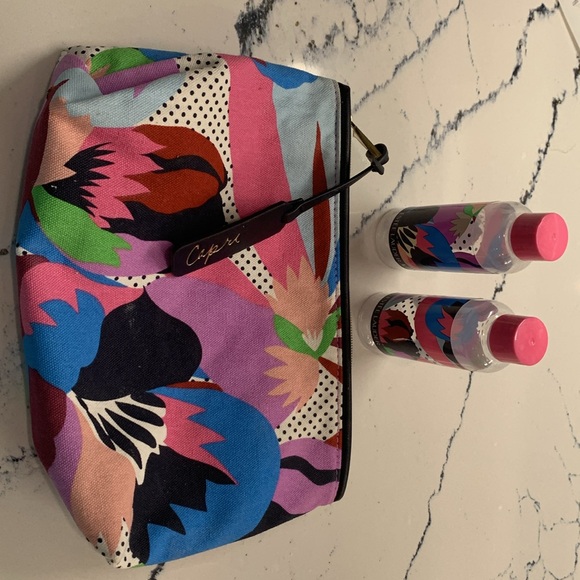 Estée Lauder makeup bag with two empty bottles - Picture 2 of 2